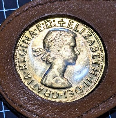 1st portrait of Queen Elizabeth II facing right wearing a laurel Script: Latin Lettering: + ELIZABETH·II·DEI·GRATIA·REGINA·F:D: Translation: Elizabeth II by the Grace of God, Queen, Defender of the Faith Designer: Mary Gillick