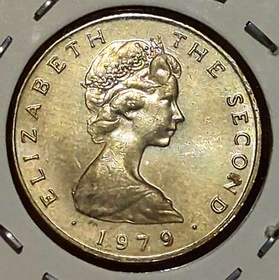 Crowned portrait facing right, lettering around edge, date below. Engraver's initials below portrait Script: Latin Lettering: ELIZABETH THE SECOND PM · 1980 · Engraver: Arnold Machin Read more on Wikipedia